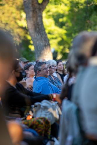 The audience listens to stories